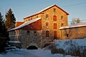 Sunset winter view of the Old Stone Mill National Historic Site of Canada, Delta, Ontario